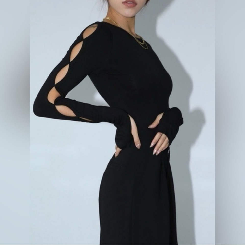 Black Long Sleeve Bodysuit with sleeve cutouts and thumb hole / Worn once / XS